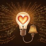 A lightbulb filled with a glowing heart, radiating beams of inspiring love quotes